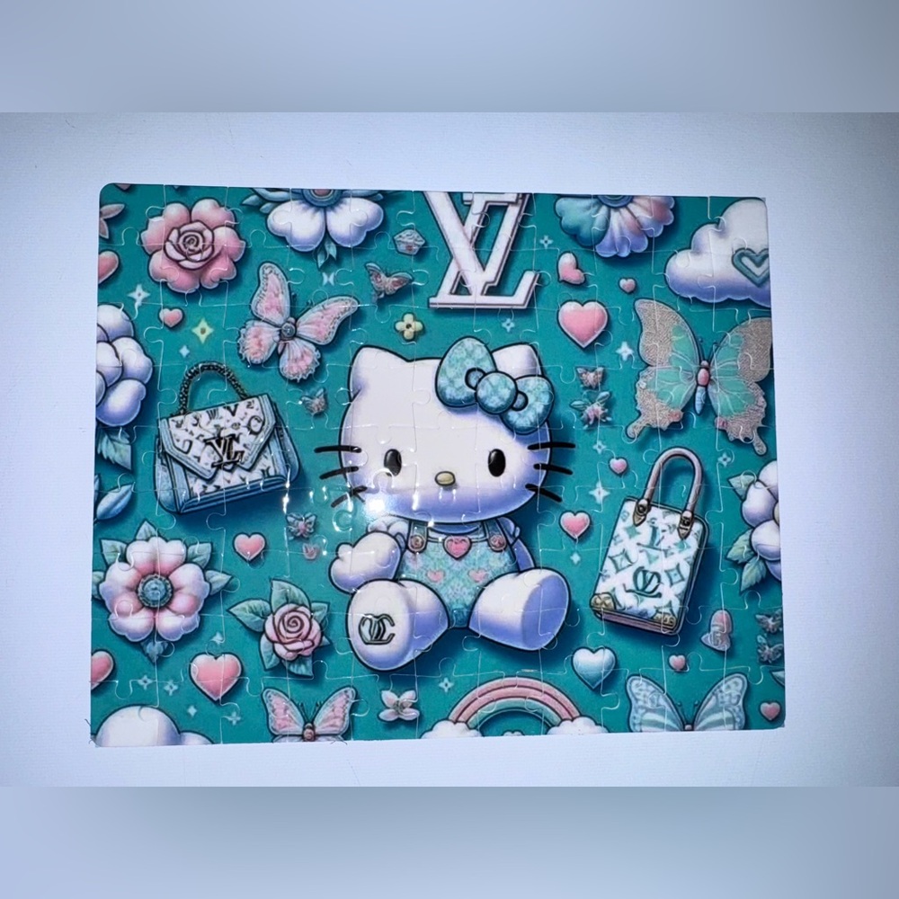 - Handmade Hello Kitty Puzzle with Teal and Pink Accents